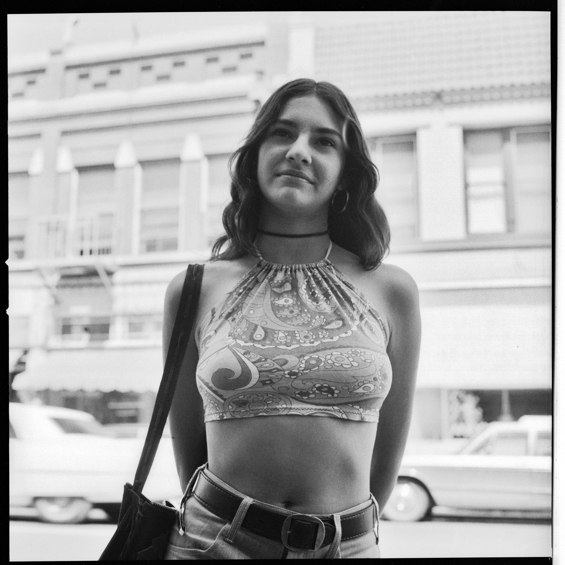Woman In Front of El Centro Cultural de la Gente