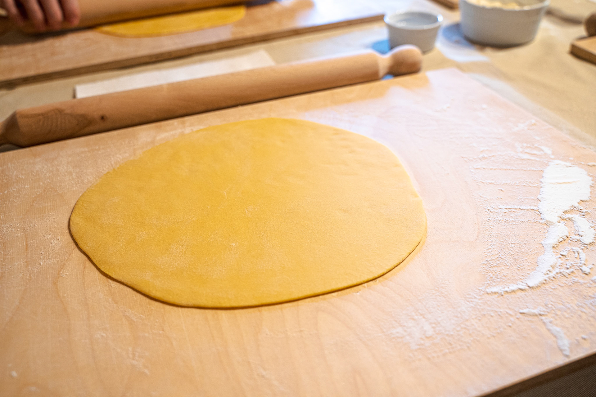 Rolling out the homemade pasta dough