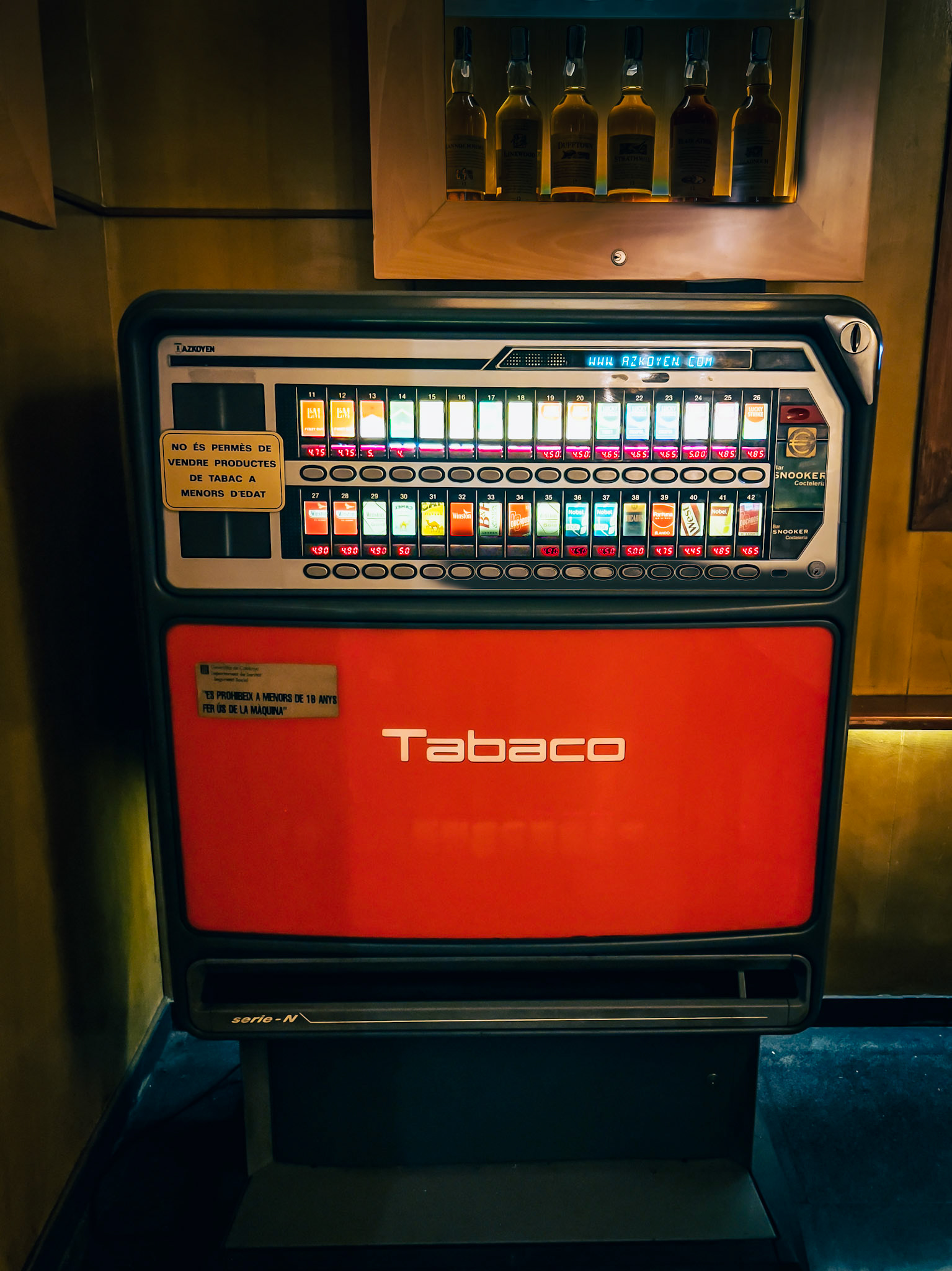 An old cigarette machine at a local bar