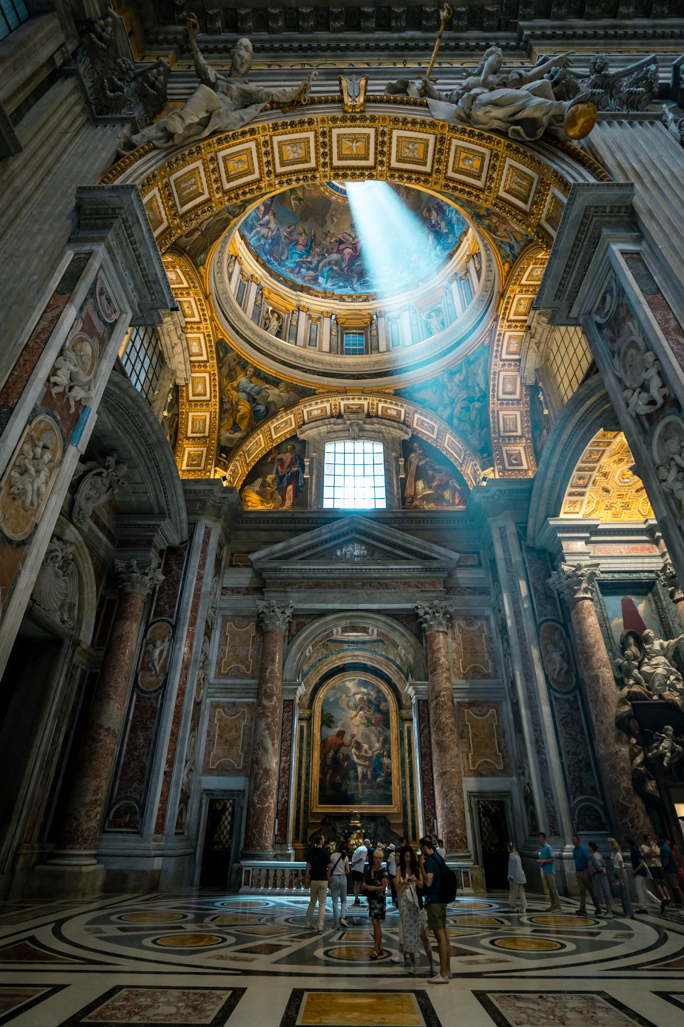 Light showing through the ceiling of St. Peter's Basilica