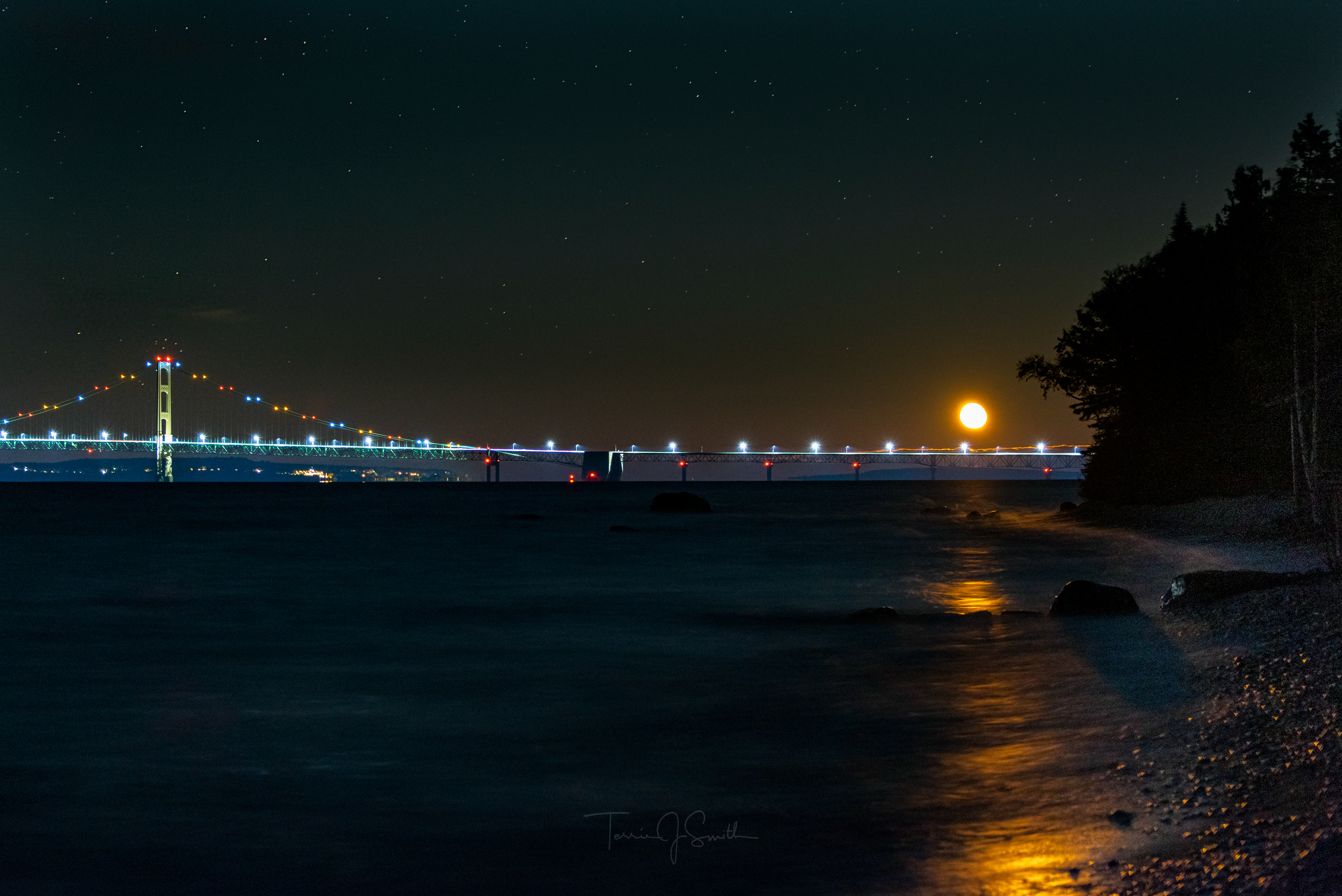 Full Moon Rising Over the Mackinac Bridge