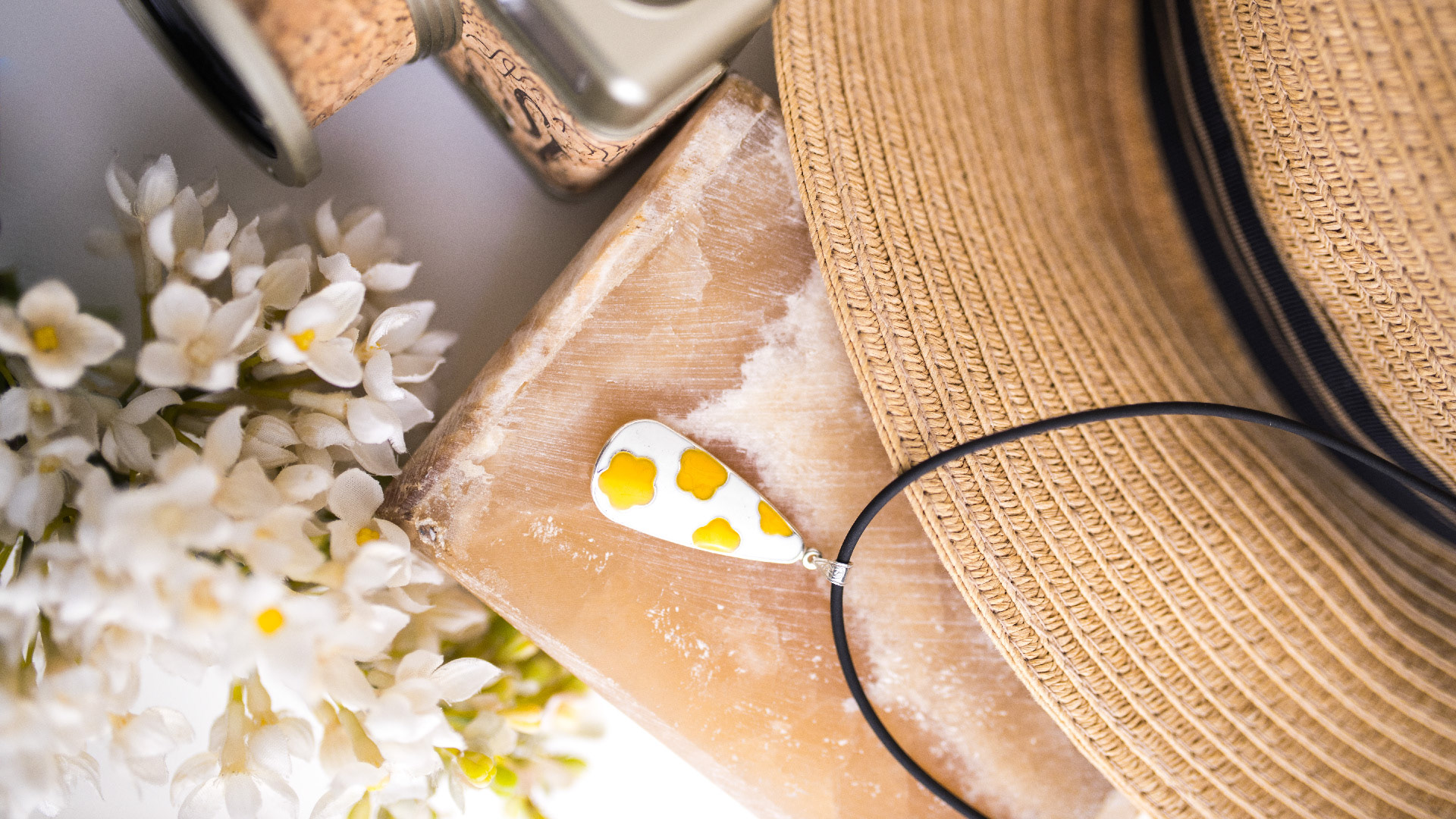 A yellow AleGio necklace.