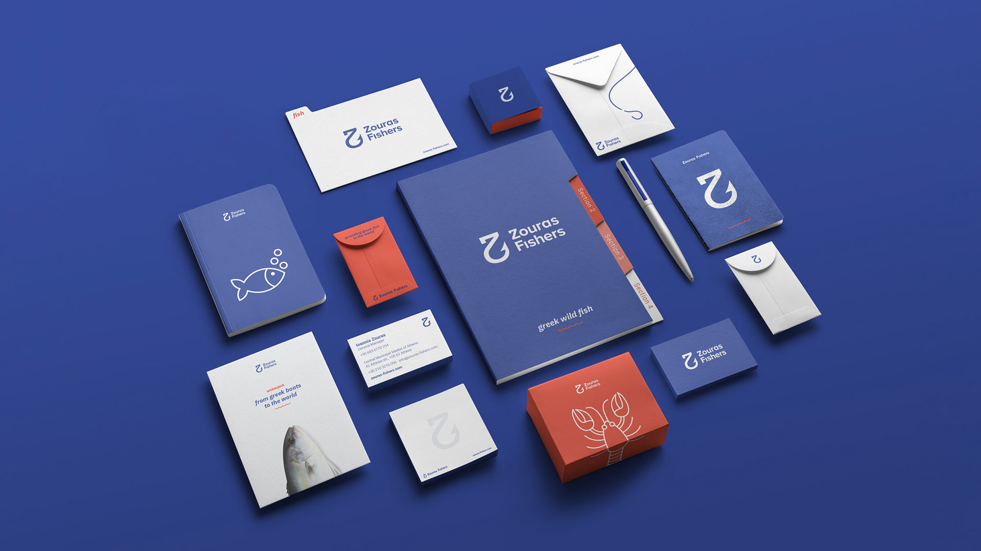 Zouras Fishers wild fish trader stationery sytem in the brand's colors. It includes a folder, envelope, block and notebook among others.