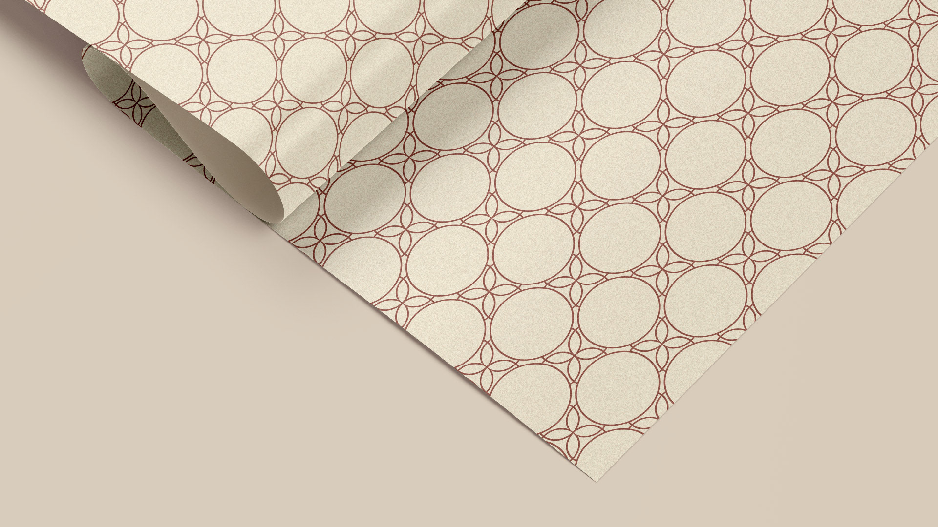 AleGio silver jewelry wraping paper featuring the brand's pattern on a beige paper.