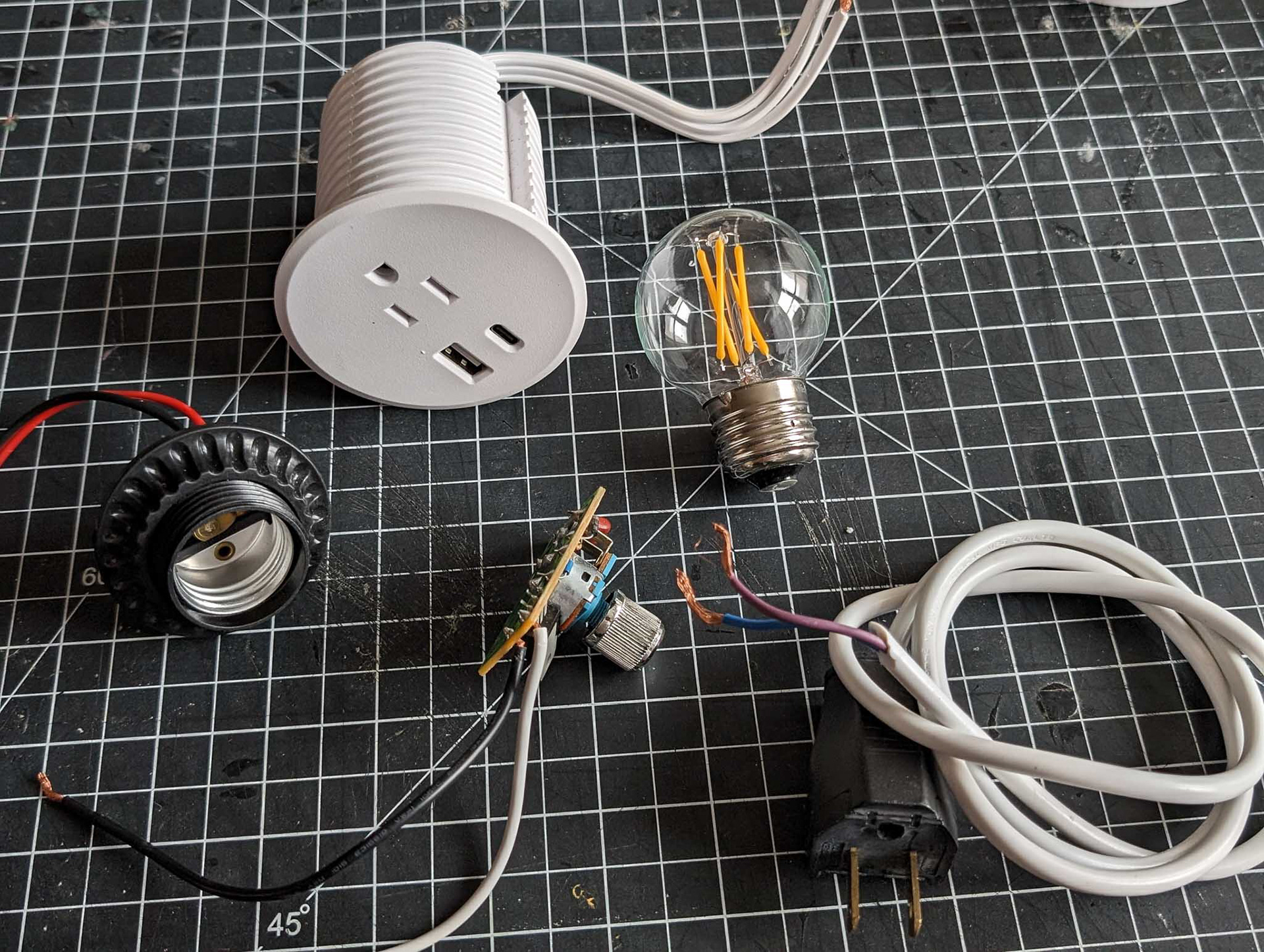 Off the shelf components and a powered grommet meant for a desk