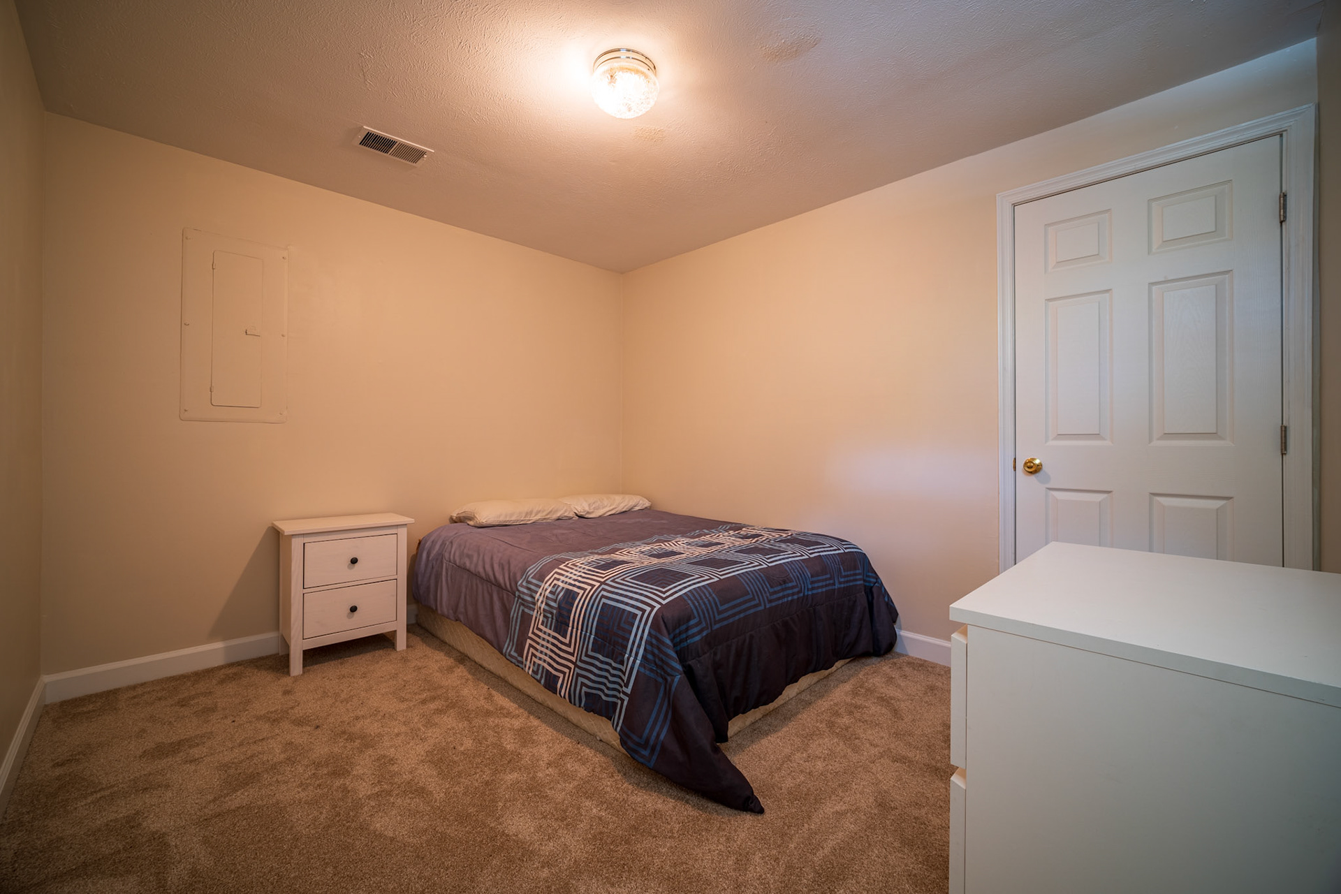 Basement Bedroom. July 23rd, 2021. Shot with Sony a6600 w/ Laowa 9mm f2.8 Zero-D Lens. 5 Layer HDR Exposure.