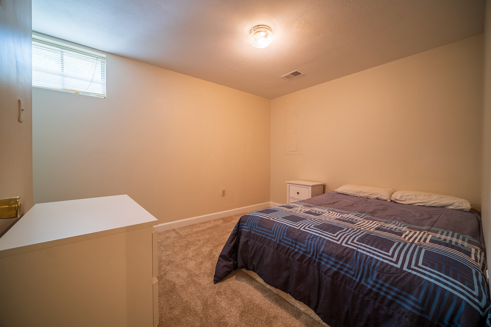 Basement Bedroom. July 23rd, 2021. Shot with Sony a6600 w/ Laowa 9mm f2.8 Zero-D Lens. 5 Layer HDR Exposure.