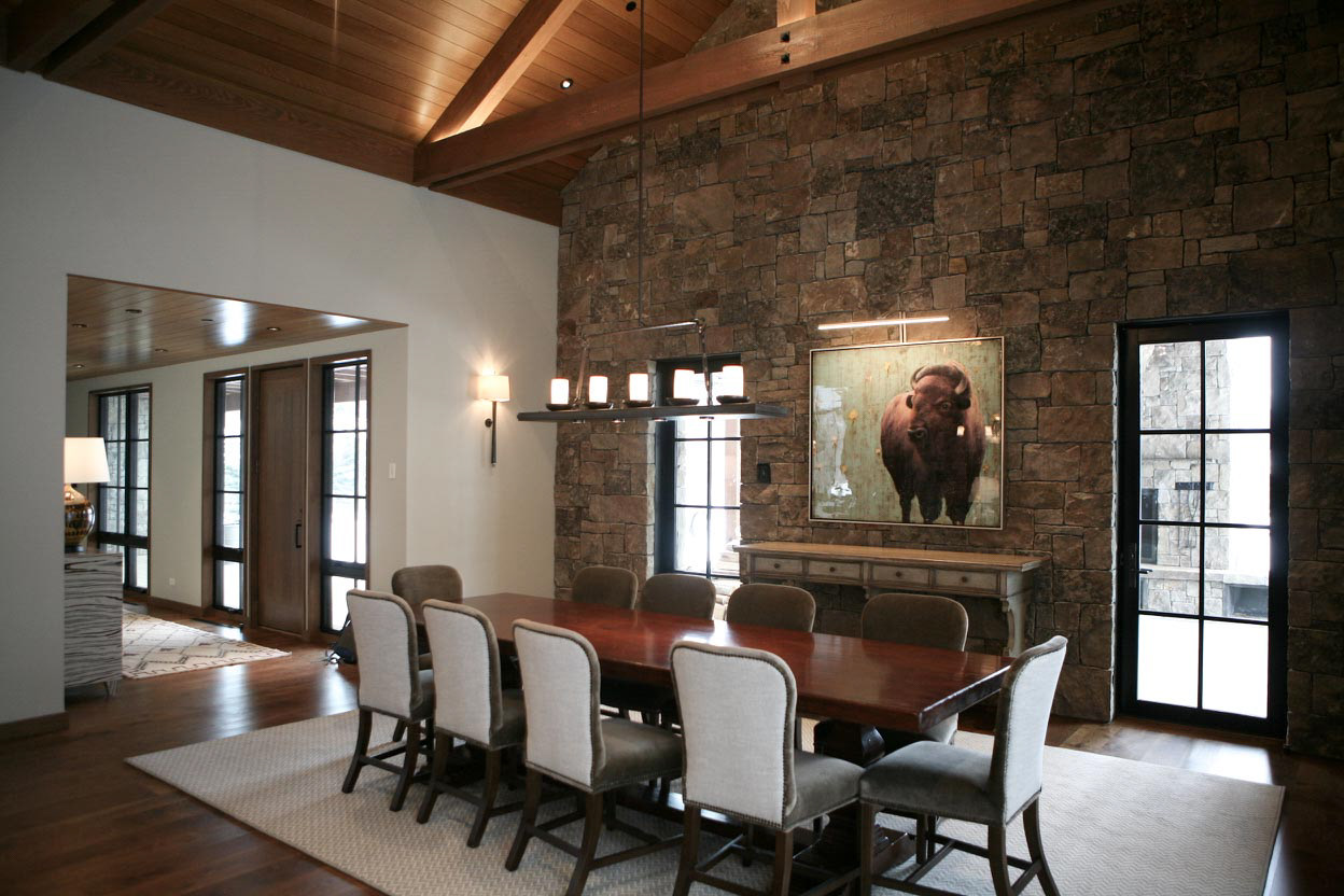 Dining Room and Large Stone Interior Wall