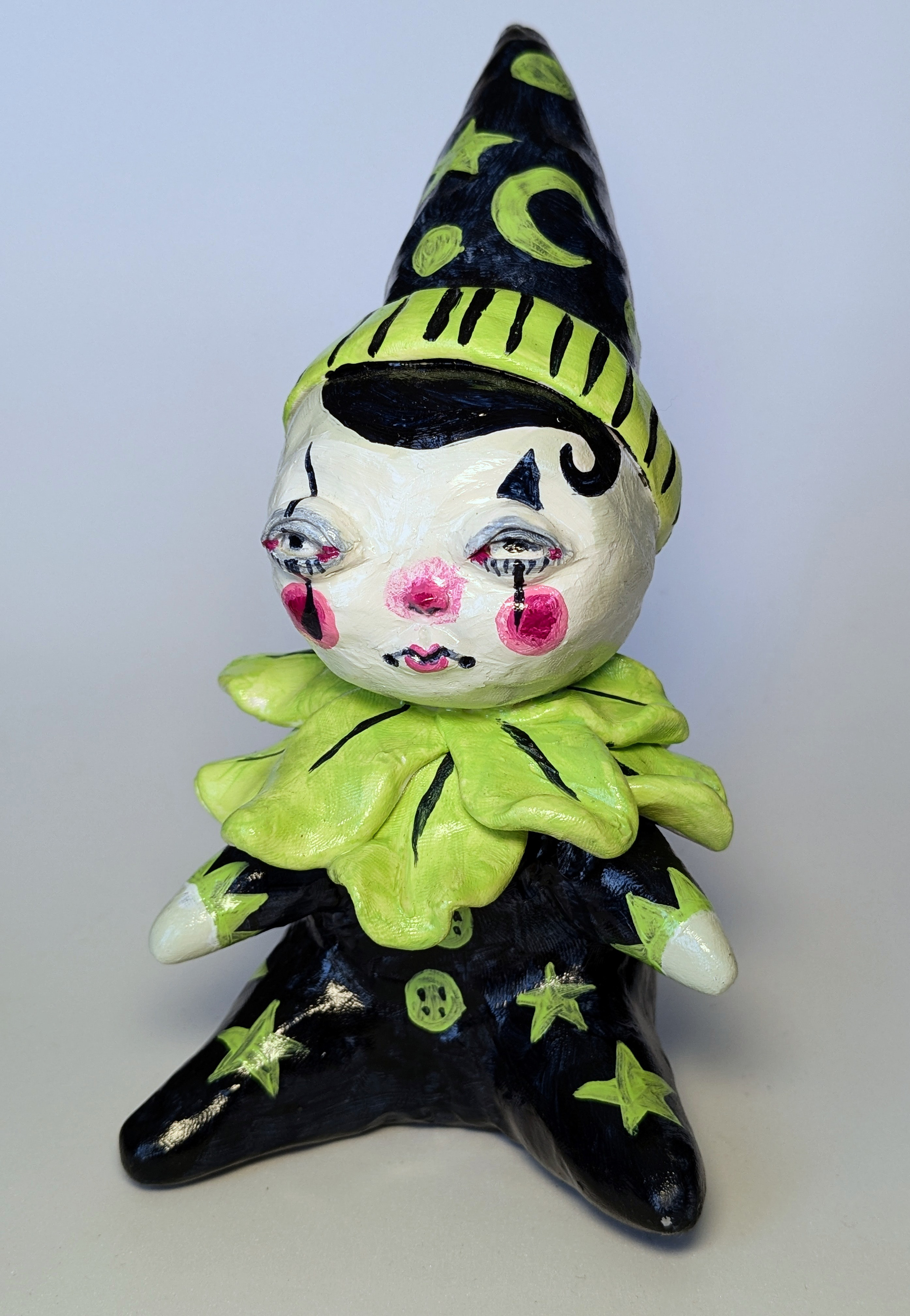 "Clown Baby", 2024. 4x4x7.5", polymer clay, acrylic paint.