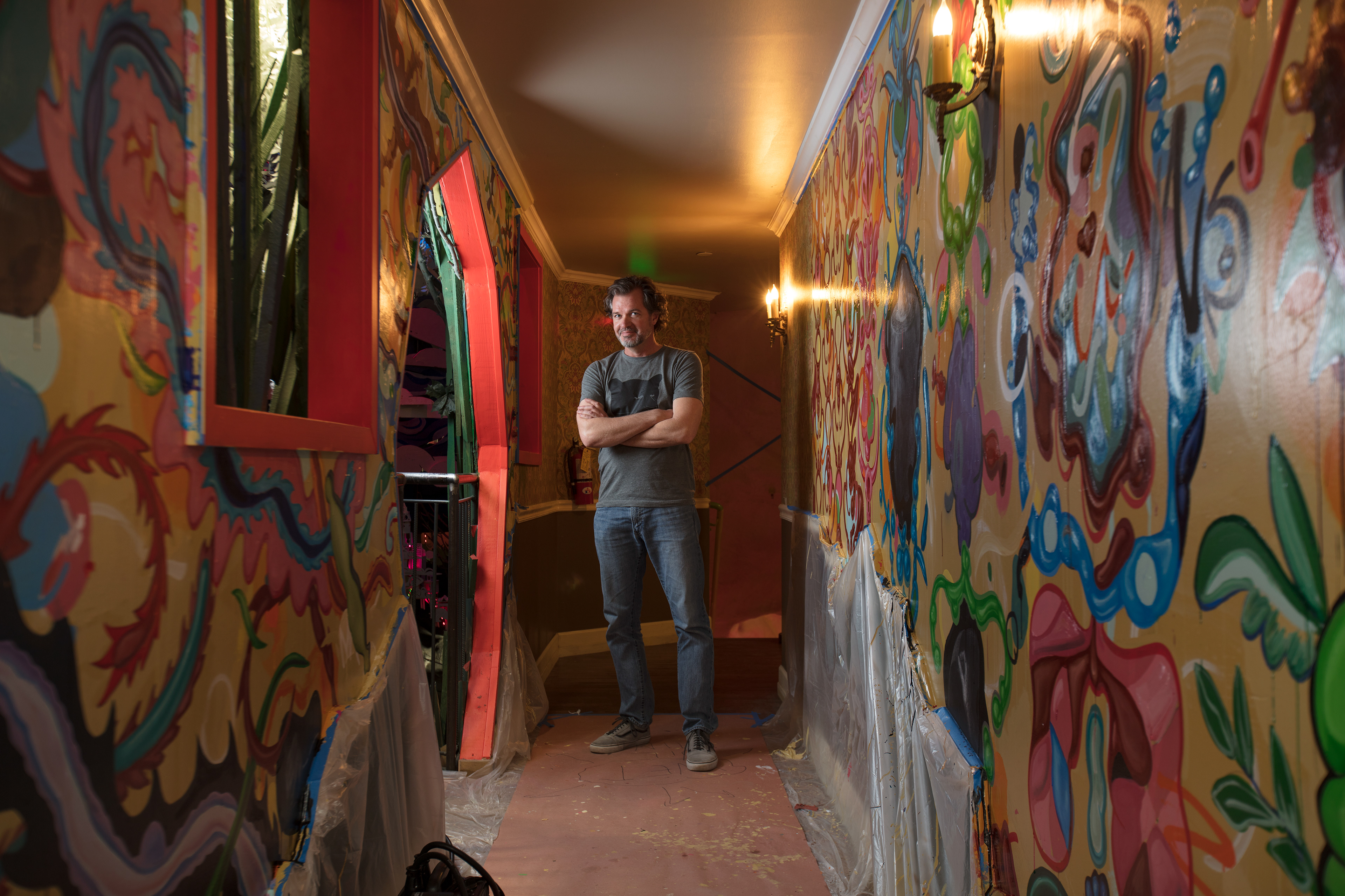 Photo of me by Kate Russel for MEOW WOLF before my mural was finished