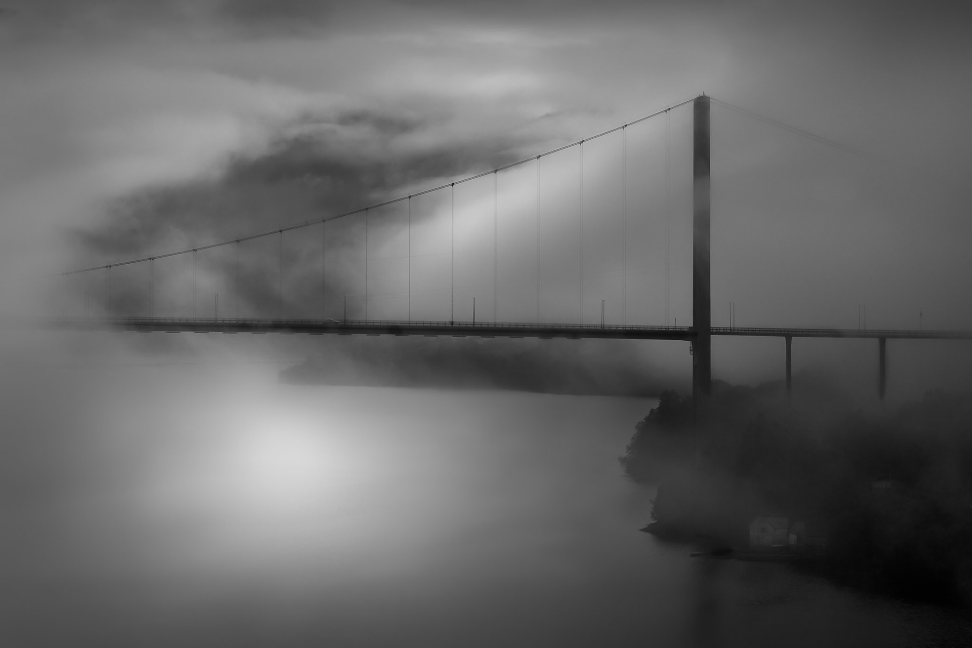 Bridge over Foggy Water